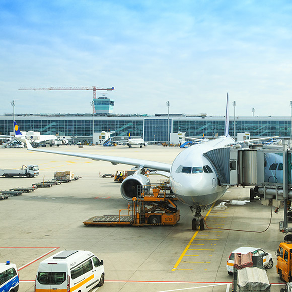Banner_Products_High-Risk-Complex-Liability_02_Air-Side Parked plane to promote Greenfield Risk Solutions Insurance Brokers - High Risk Complex Liability - Airside Insurance