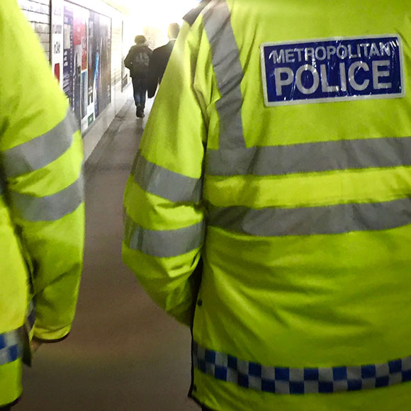 Banner_Products_High-Risk-Complex-Liability_04_Terrorism Police walking to scene of the crime to promote Greenfield Risk Solutions Insurance Brokers - High Risk and Complex Liability - Terrorism Insurance