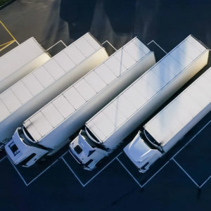 Lined up parked lorries to promote Greenfield Risk Solutions Insurance Brokers - Driver Training Insurance