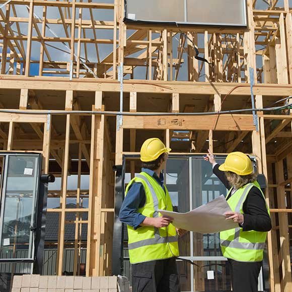 Banner_Products_Construction-Contractors_03-Contract-Works-Construction-1 Construction workers evaluation in-progress building to promote Greenfield Risk Solutions Insurance Brokers - Construction and Contractors Insurance - Contract works