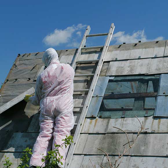 Banner_Products_Specialist-Risk-Contractors_02-Asbestos-Waste-Contractors-1 Contractor treating roof for asbestos to promote Greenfield Risk Solutions Insurance Brokers - Specialist Risk and Contractor Insurance - Asbestos and Waste Contractors